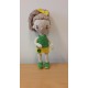 Kislány zöld/sárga ruhában, horgolt figura